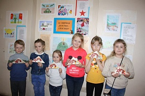 Мастер-класс "Солдатский треугольник" в предверии Дня Победы (Онежская детская библиотека)