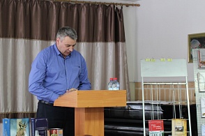 Русанов А. В. выступает с докладом "Приходно-расходная книга Мало -Пинежской волости 1787 г."